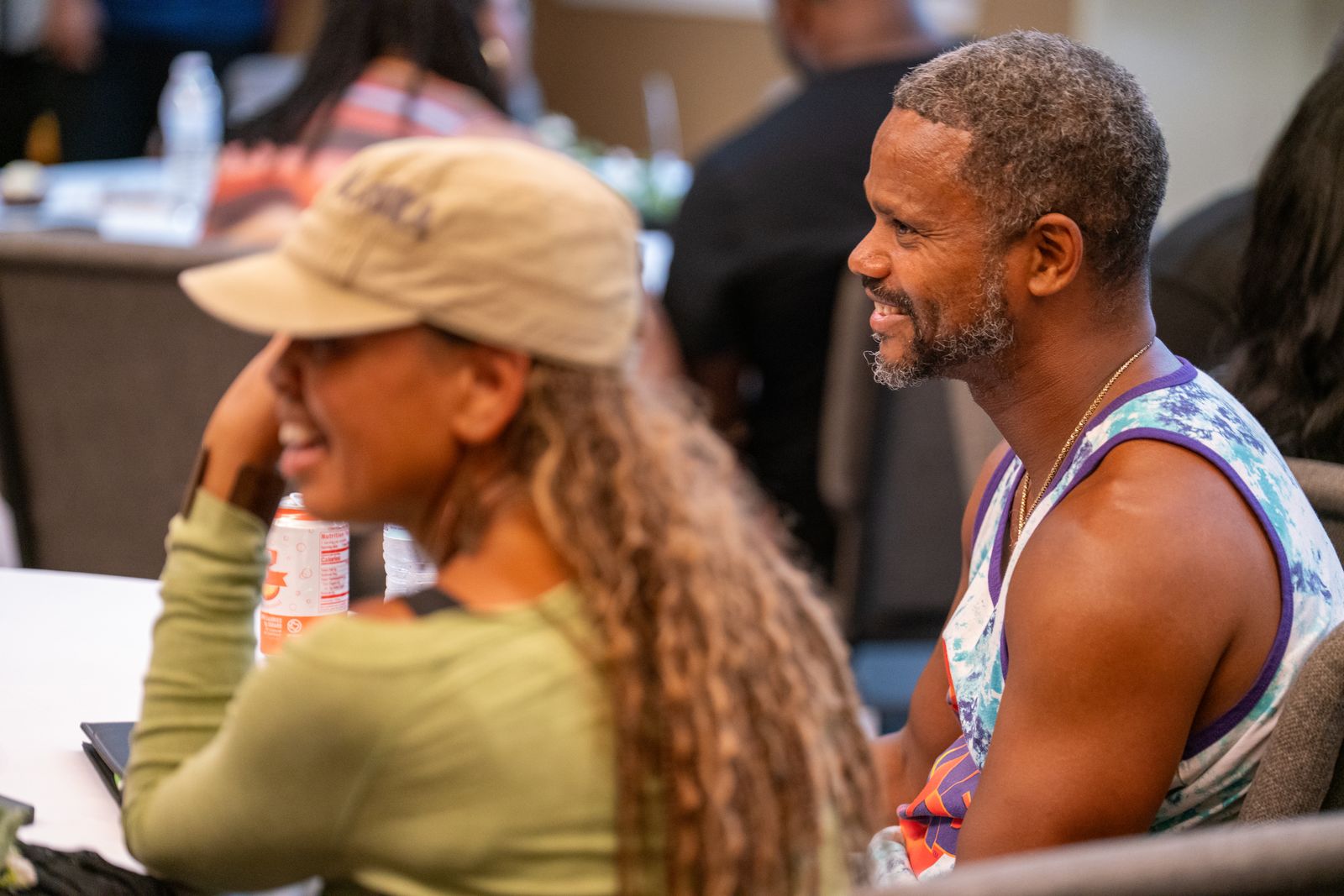 Candid laughter between attendees